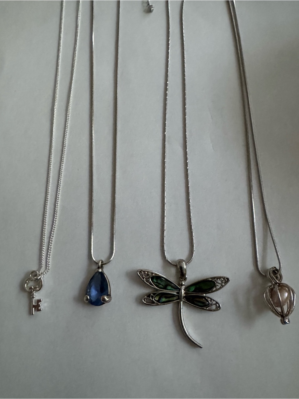 Lot of 4 silver tone necklace. Freshwater Pearl and Abalone